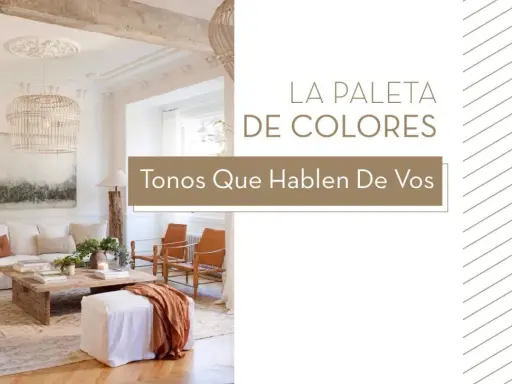 Salón con sofás blancos, mesa de centro rústica y acentos terracota. El **orden visual** se logra con la paleta de colores neutros y texturas naturales.