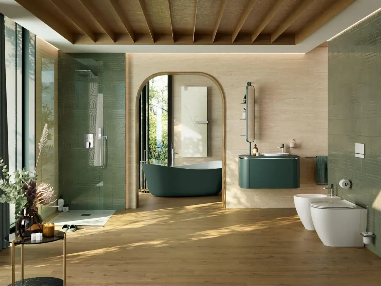 Baño moderno con ducha verde, bañera oscura y lavabo. Los tonos tierra y madera combinan con el gris, creando un ambiente sereno.